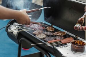 pexels-photo-1857732-1857732 Delicious meats and sausages grilling on a barbecue outside, perfect for a summer picnic.